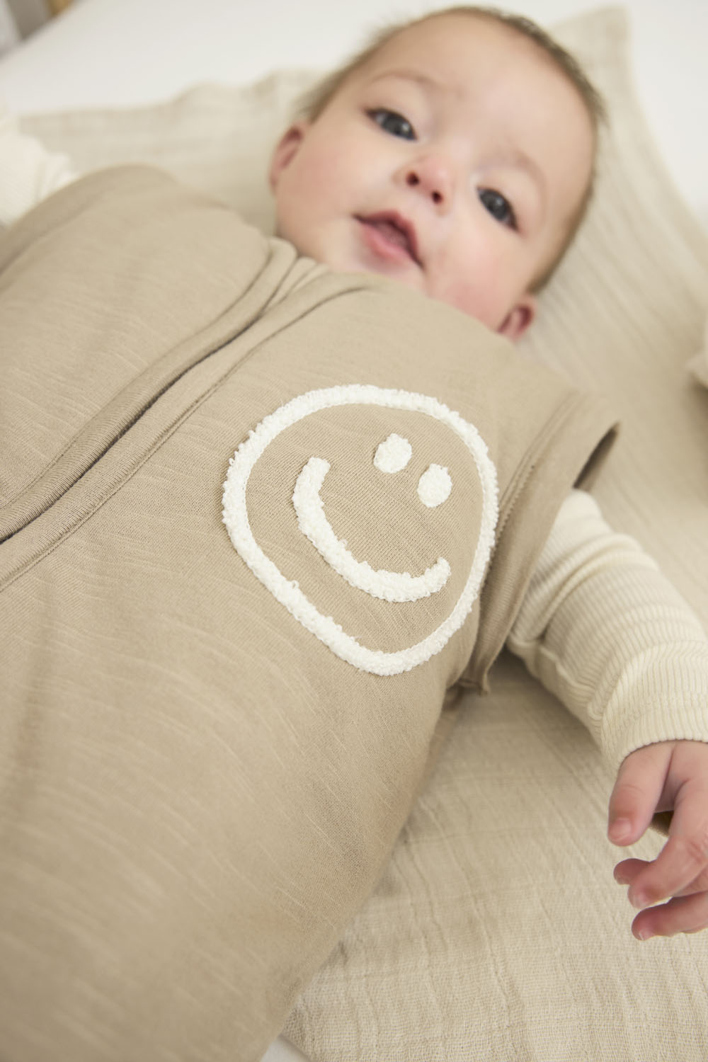 Slaapzak met afritsbare mouwen en Smile applicatie - Tau